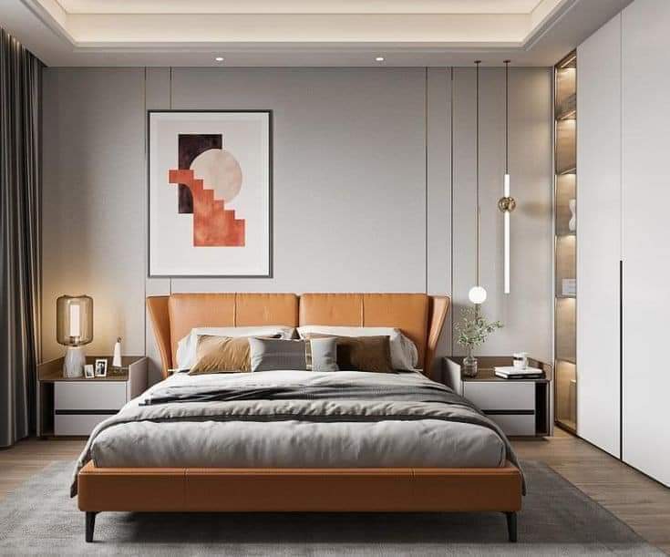 Tan leather low-profile bed with modern pendants