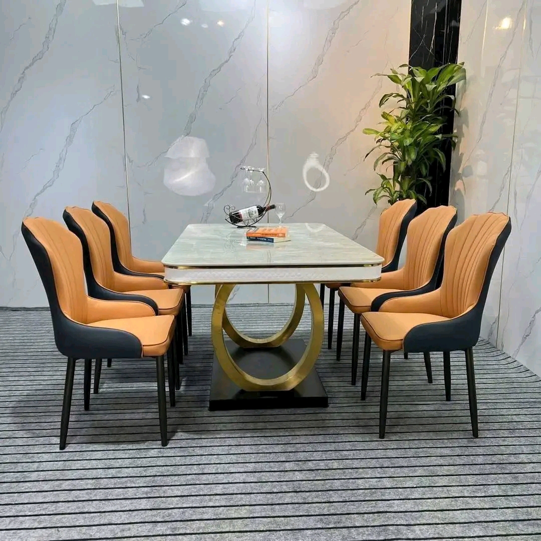 Marble top + gold arch base with amber chairs