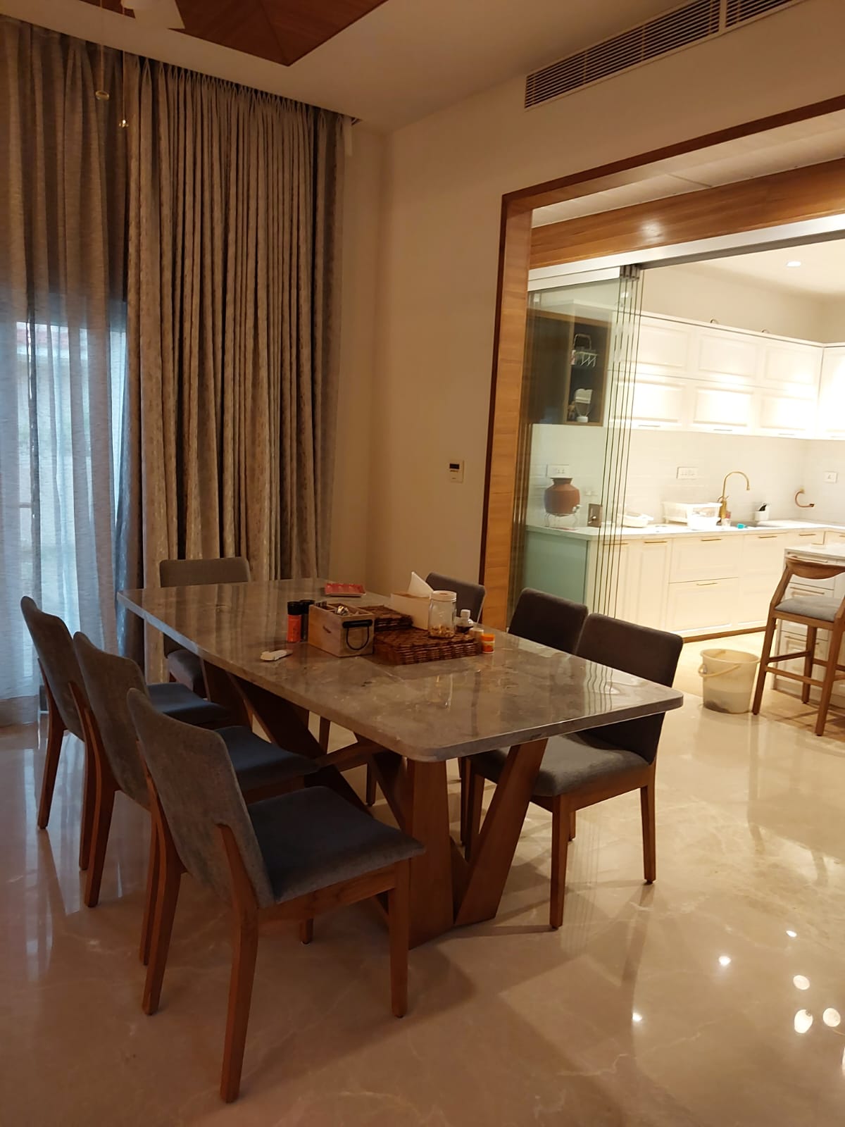 Grey marble table with walnut X-frame & grey chairs