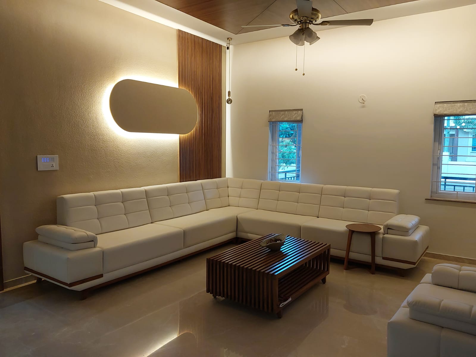 White L-sofa in a bright daylit room