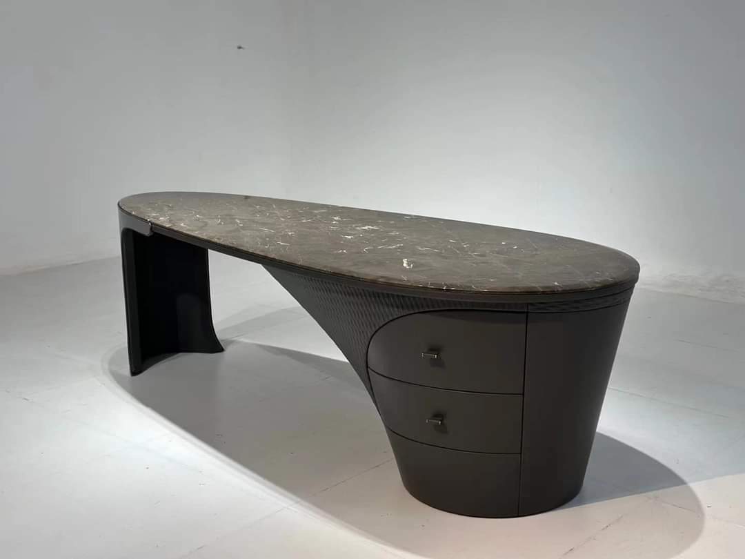Dark marble oval TV console — bold statement