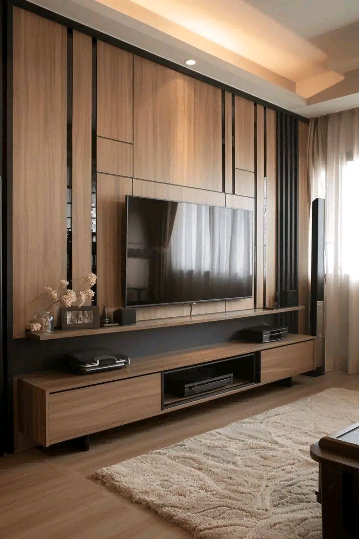 Dark walnut TV wall with ambient lighting