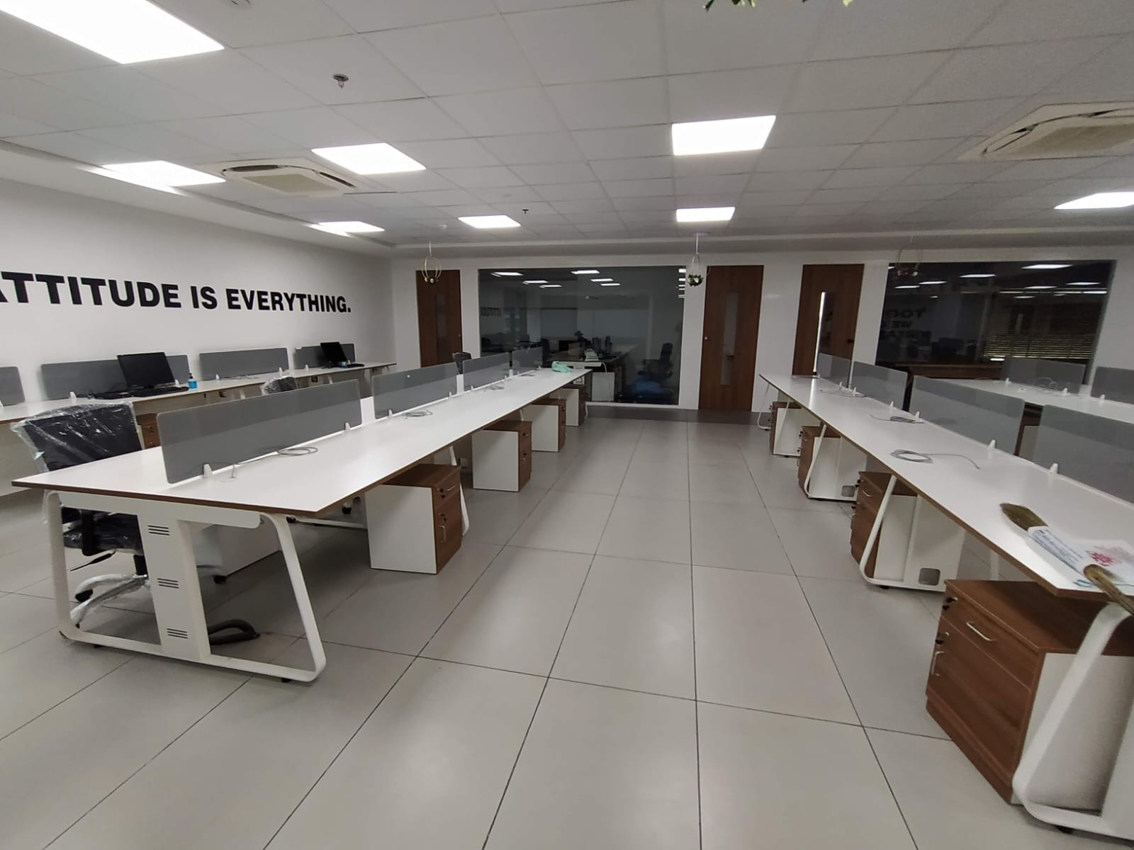 Corporate fit-out — false ceiling with track lighting