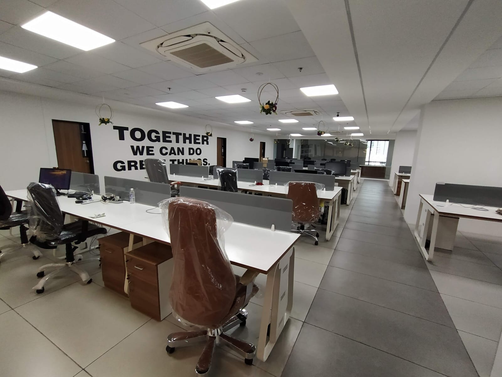 Office build — reception counter and glass wall