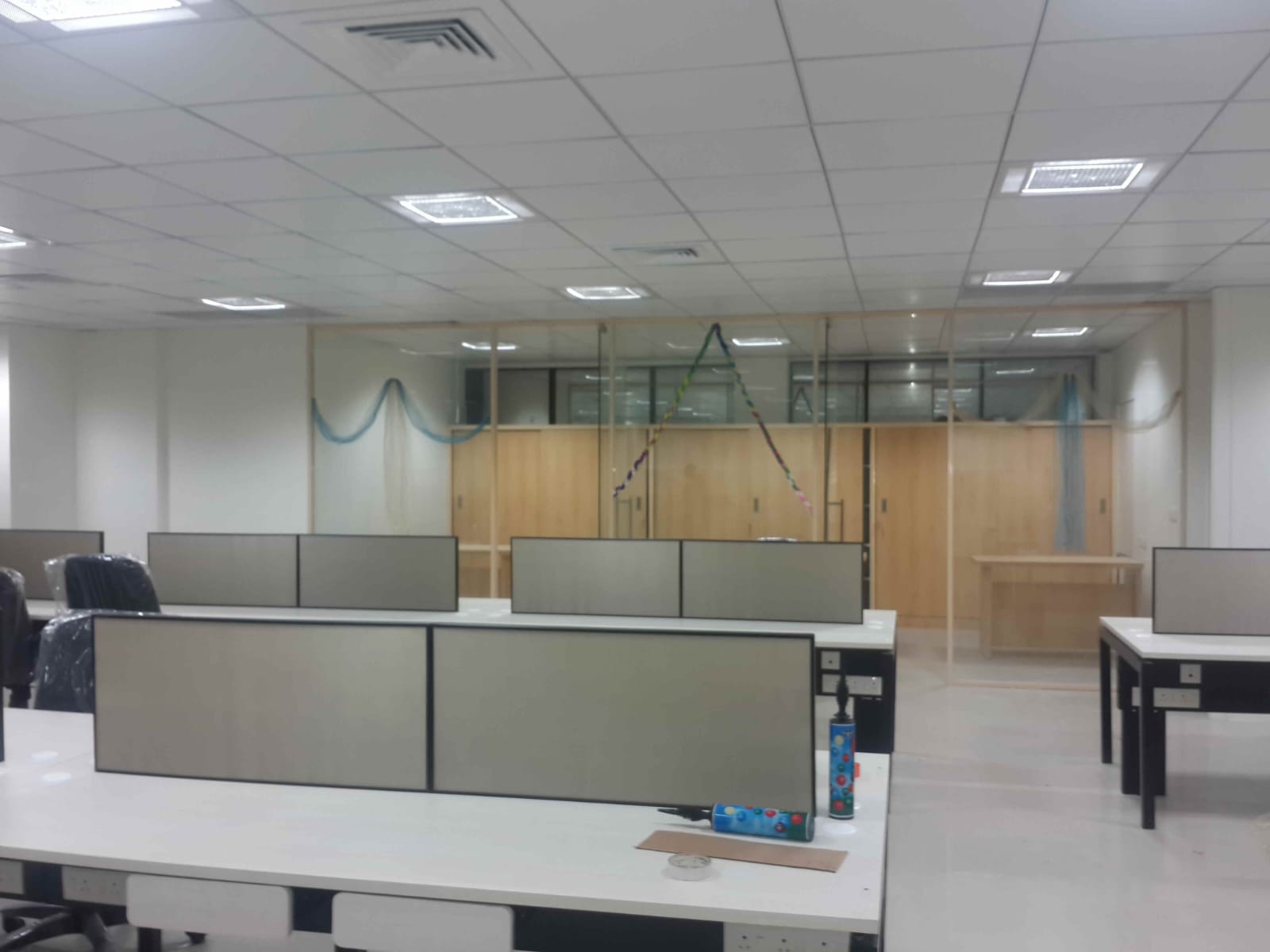 Commercial fit-out — wall cladding and lighting works